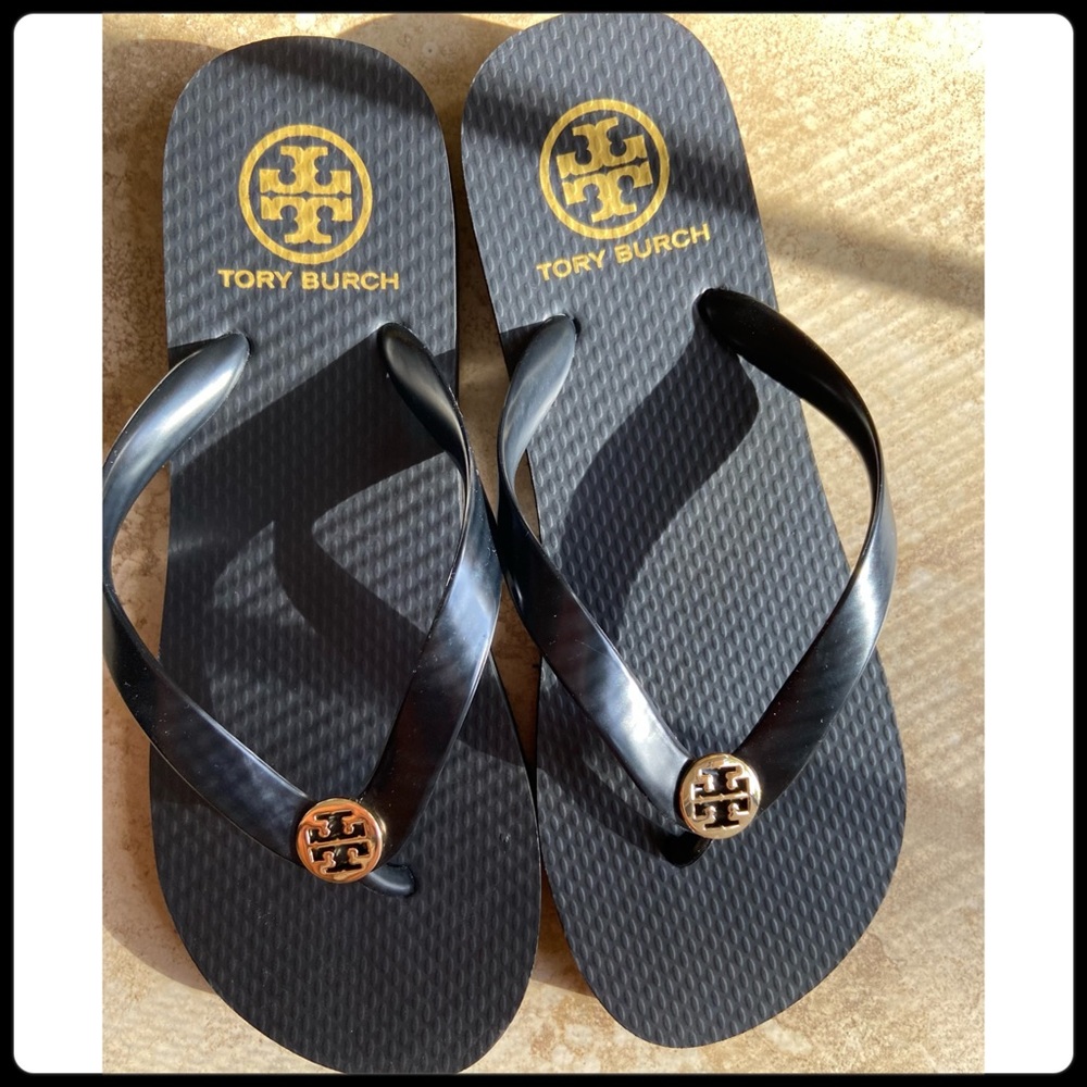 Tory Burch flip flops, Size 8, black and gold